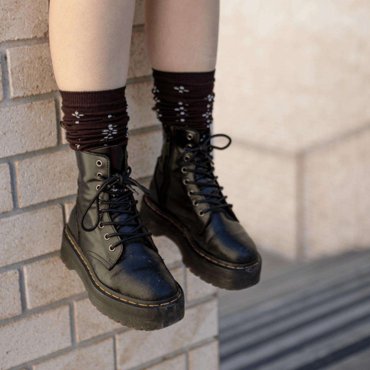 Merino Wool Socks from the Mis-fits collection featuring a maroon design with floral patterns.