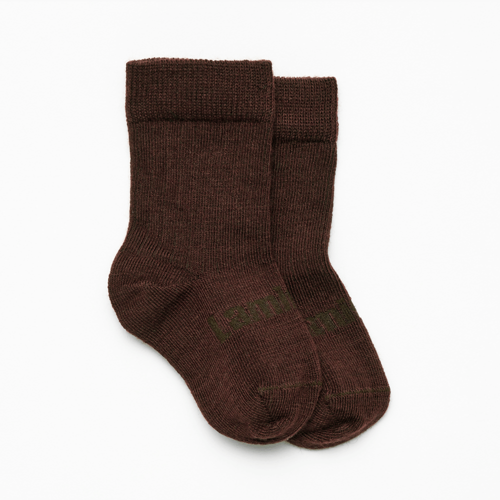 Baby Merino Wool Crew Socks in rich chocolate brown color, perfect for keeping tiny feet snug and stylish.