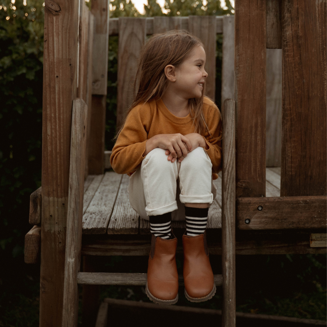 Merino Wool Crew Socks for Child - West, featuring a black base with latte stripes.