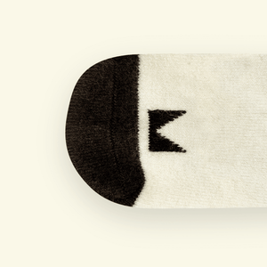 Merino Wool Baby Socks by Pixel, featuring a soft, cosy design with Mosey logo pattern.