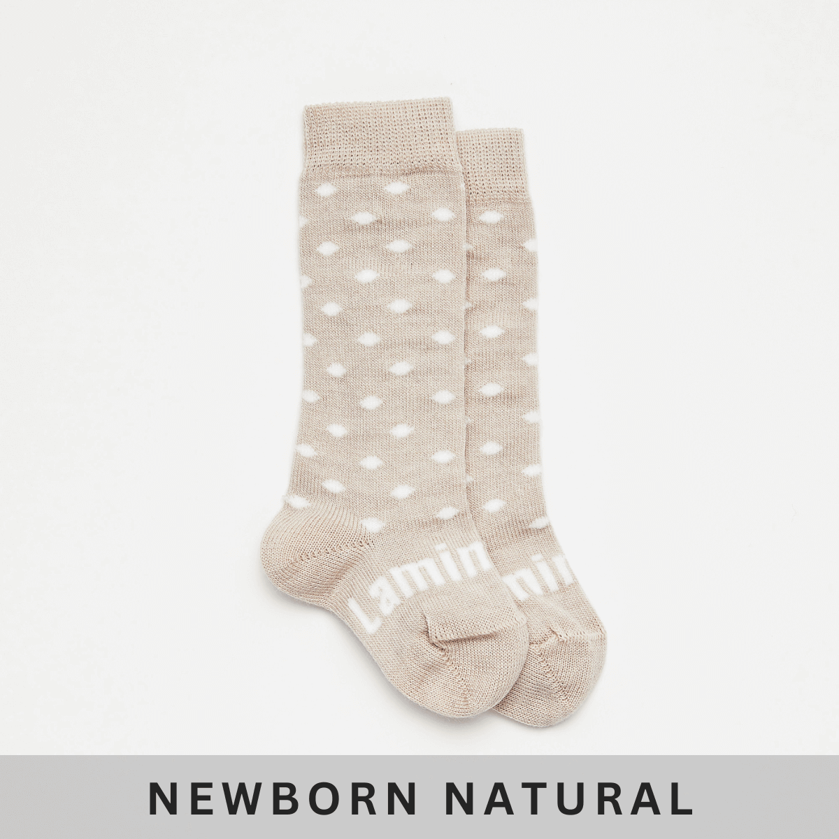 Merino Wool Knee High Socks for Baby in Truffle with white spots from the Newborn Natural Collection.