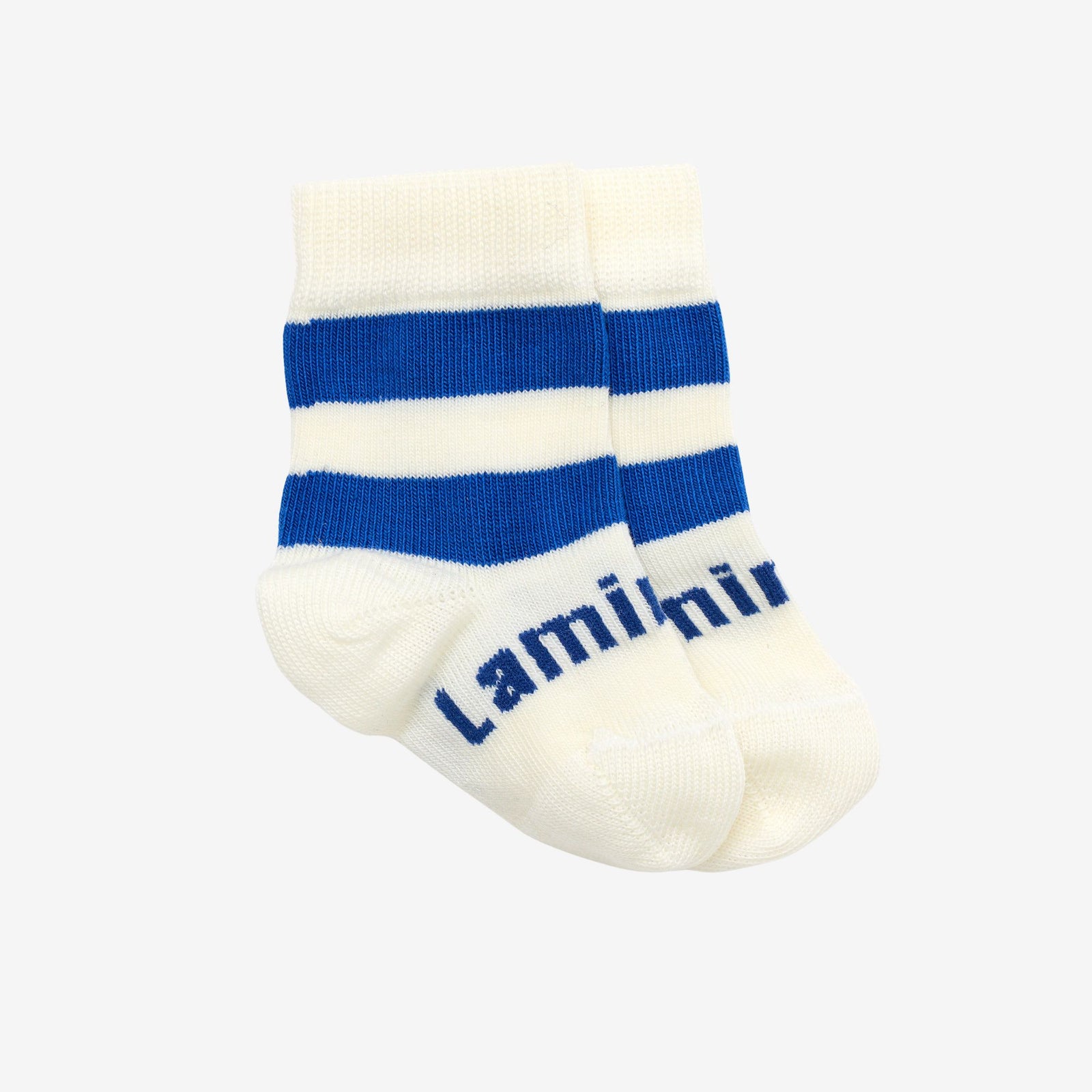Cream colored baby merino sock with royal blue stripes
