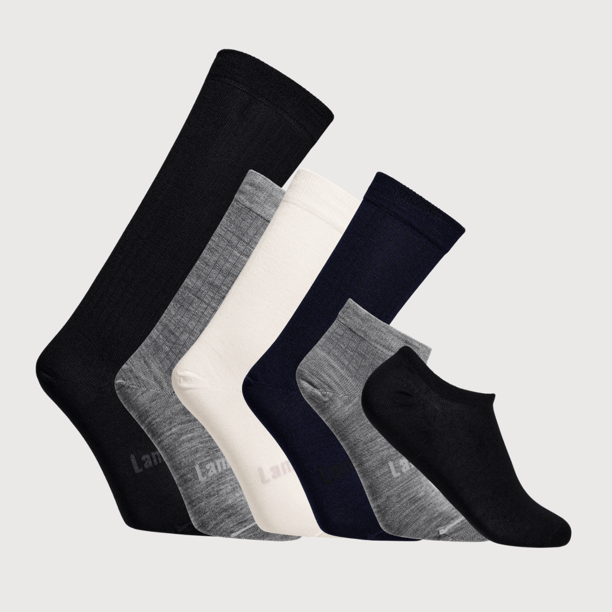 pack of 7 pairs of women's merino socks in various designs and colours